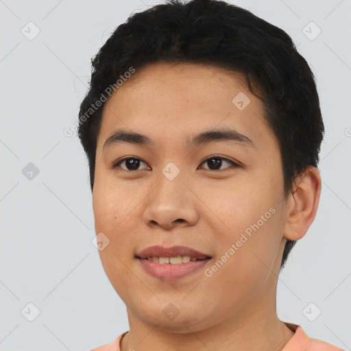 Joyful asian young-adult male with short  brown hair and brown eyes