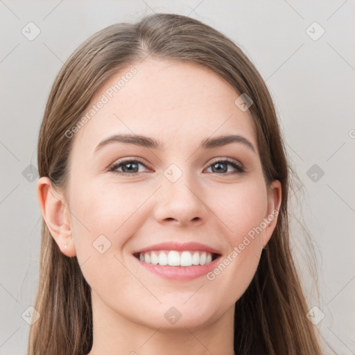 Joyful white young-adult female with long  brown hair and grey eyes