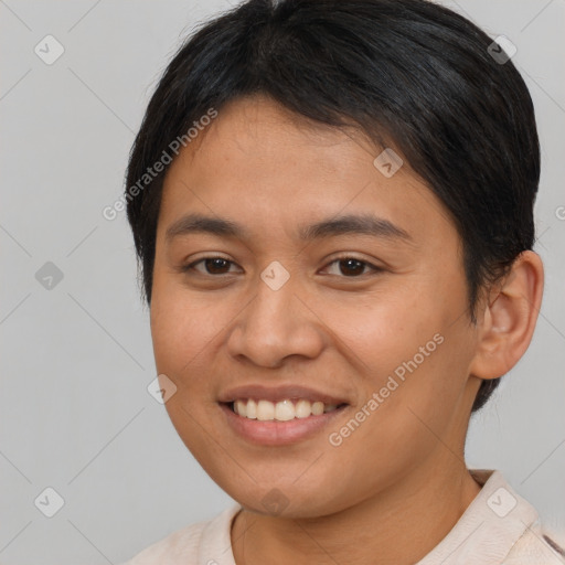 Joyful asian young-adult female with short  brown hair and brown eyes