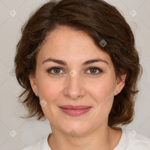 Joyful white young-adult female with medium  brown hair and green eyes