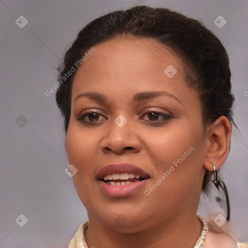 Joyful black young-adult female with medium  brown hair and brown eyes