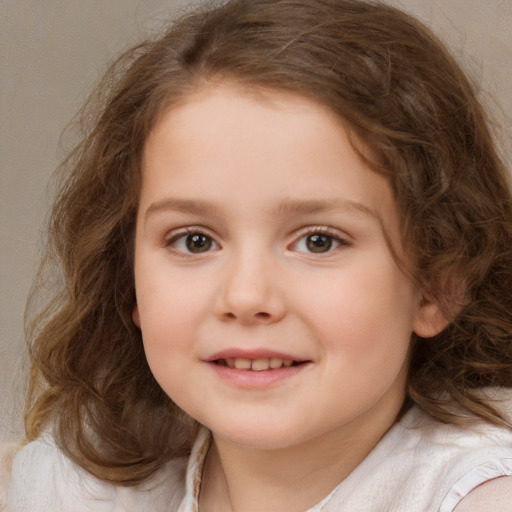 Joyful white child female with medium  brown hair and brown eyes