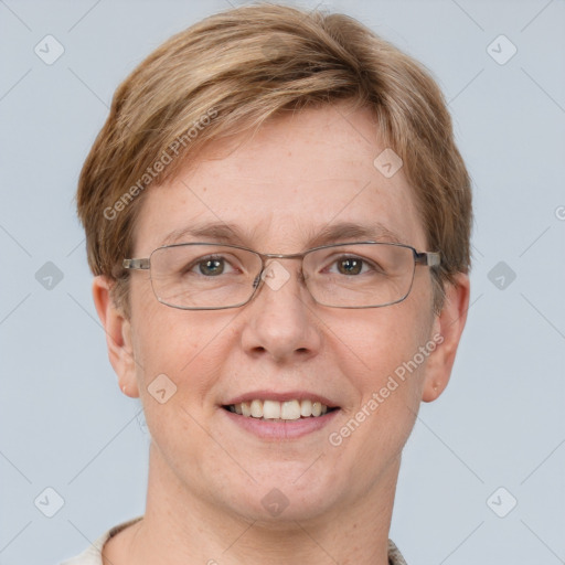 Joyful white adult female with short  brown hair and grey eyes