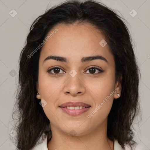 Joyful latino young-adult female with medium  brown hair and brown eyes