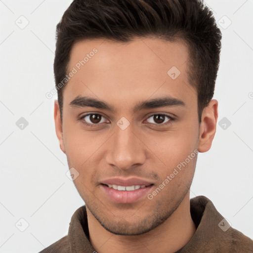 Joyful white young-adult male with short  brown hair and brown eyes