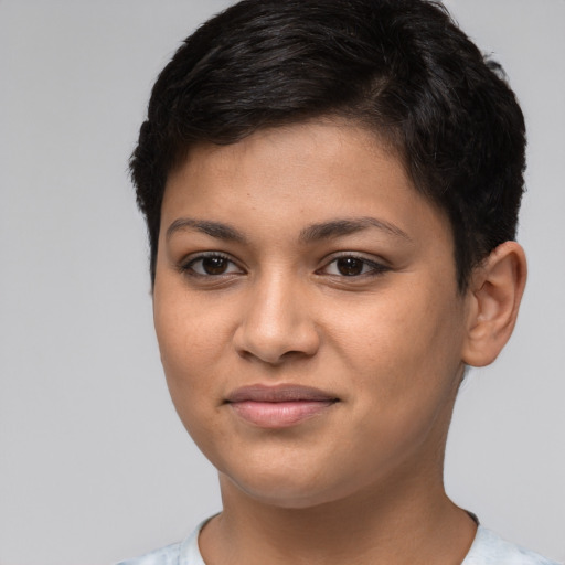 Joyful latino young-adult female with short  brown hair and brown eyes