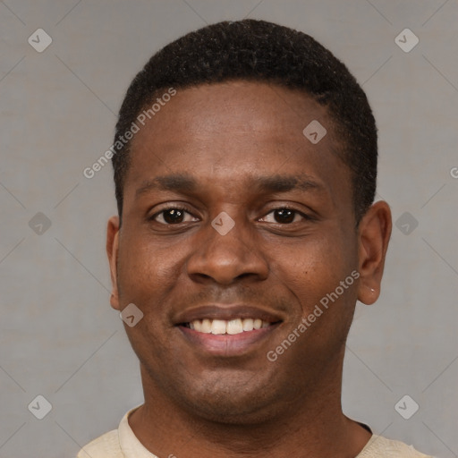 Joyful latino young-adult male with short  brown hair and brown eyes