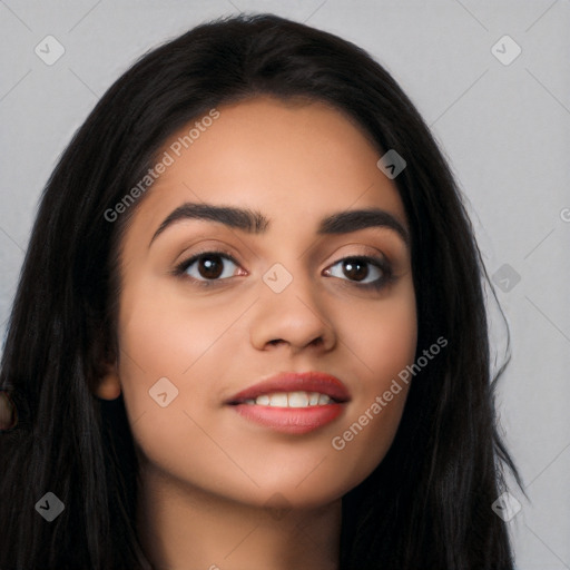 Joyful latino young-adult female with long  black hair and brown eyes