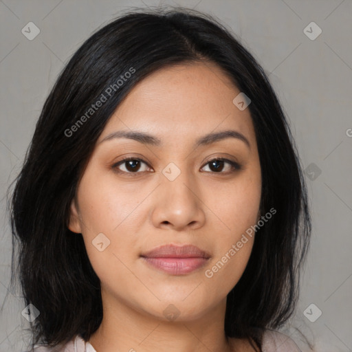 Joyful asian young-adult female with medium  black hair and brown eyes