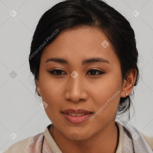 Joyful latino young-adult female with medium  brown hair and brown eyes