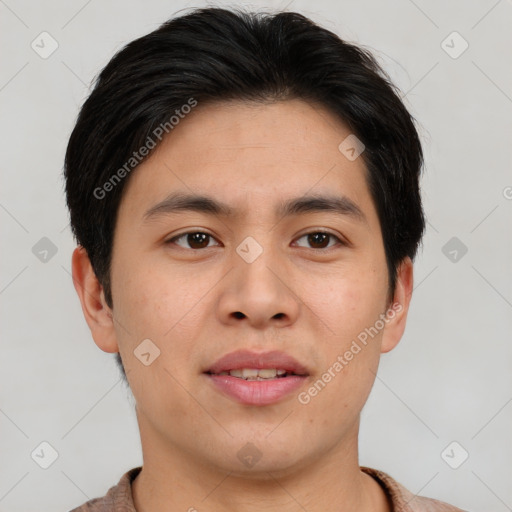 Joyful asian young-adult male with short  brown hair and brown eyes