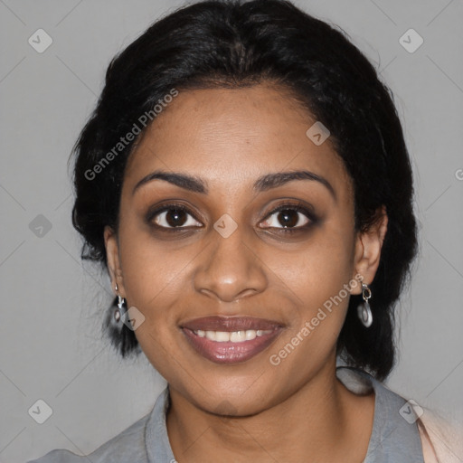 Joyful black young-adult female with medium  black hair and brown eyes