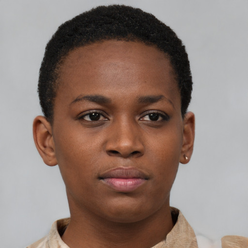 Neutral black young-adult female with short  brown hair and brown eyes