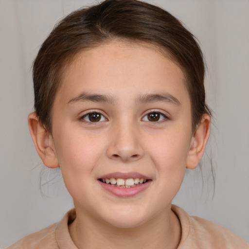 Joyful white child female with medium  brown hair and brown eyes