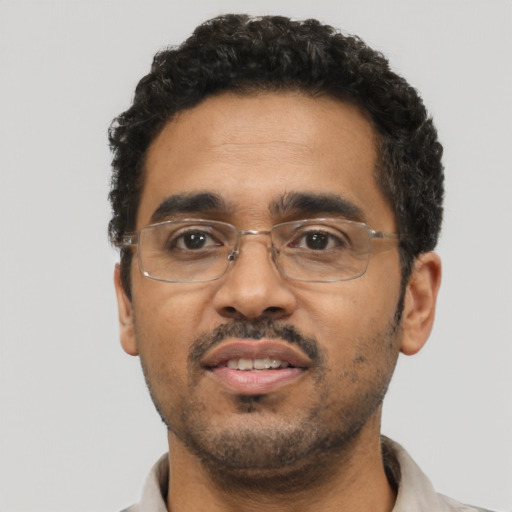 Neutral latino adult male with short  black hair and brown eyes