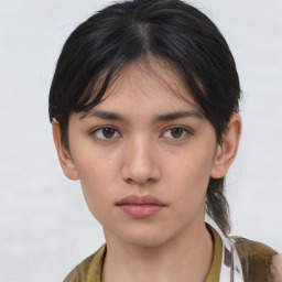 Neutral asian young-adult female with medium  brown hair and brown eyes