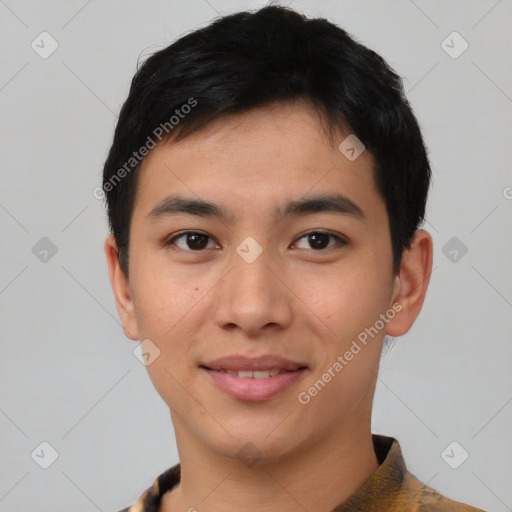 Joyful asian young-adult male with short  black hair and brown eyes