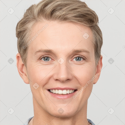 Joyful white adult female with short  brown hair and grey eyes