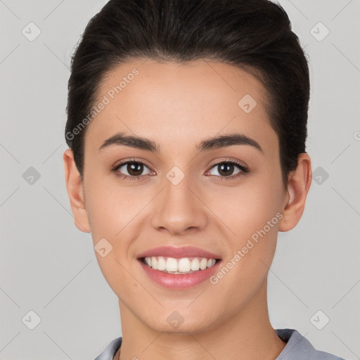 Joyful white young-adult female with short  brown hair and brown eyes