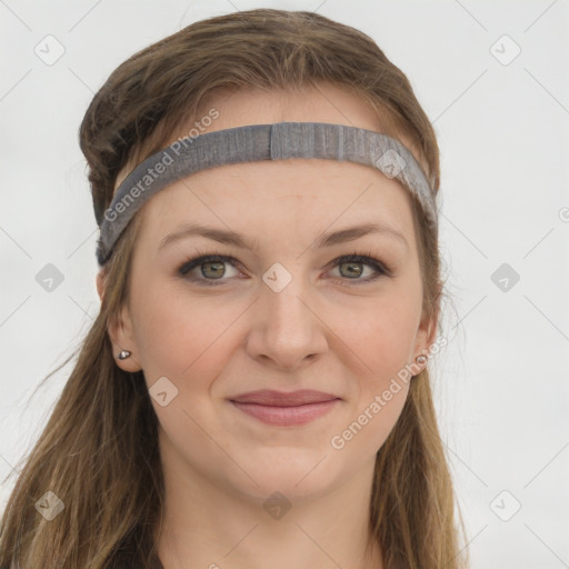 Joyful white young-adult female with long  brown hair and grey eyes