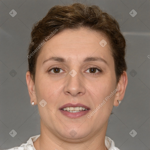 Joyful white adult female with short  brown hair and brown eyes